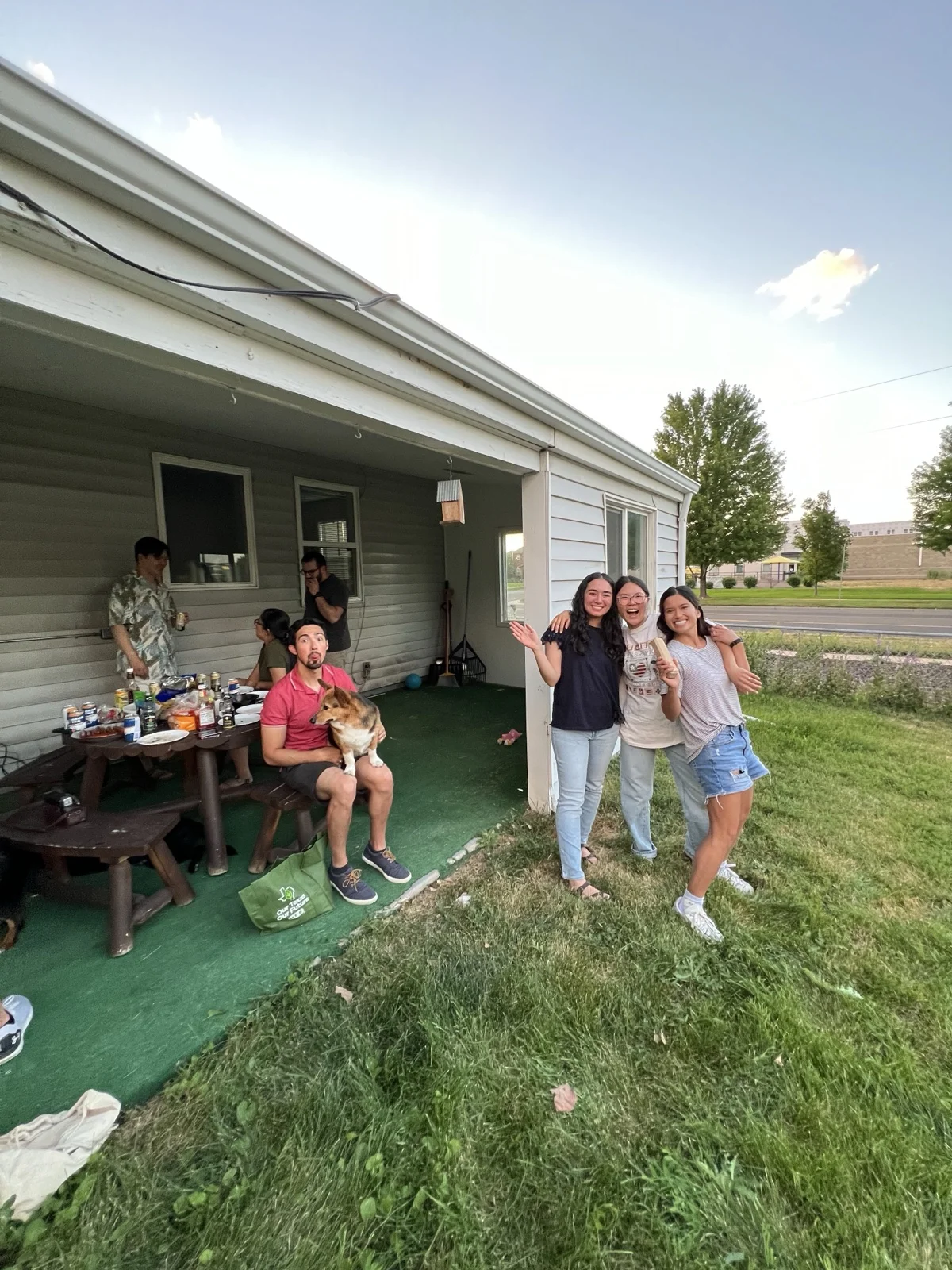 Friends hanging out in the backyard